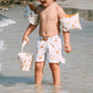 Bambino con braccioli Jungle in spiaggia